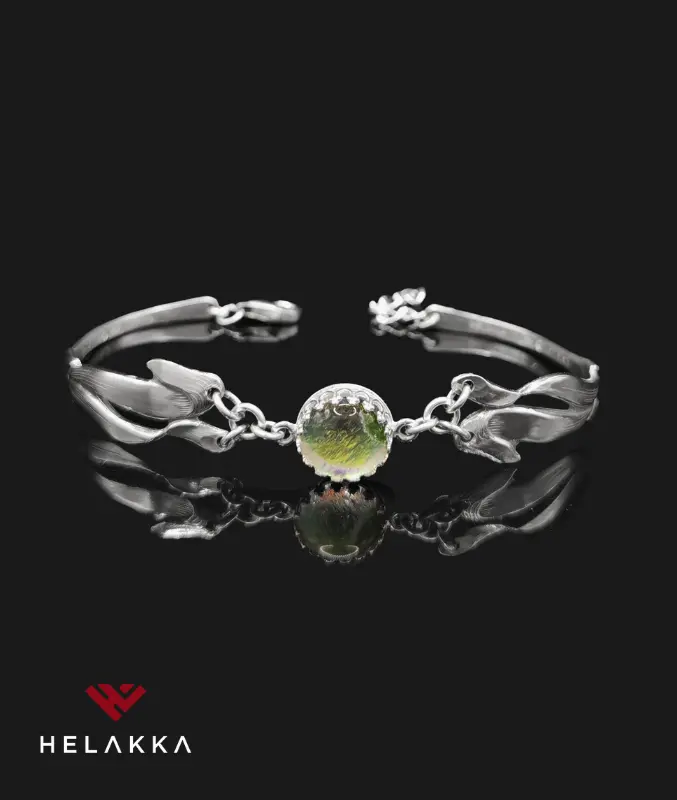 Helakka lusikkarannekoru lasilla vivahde