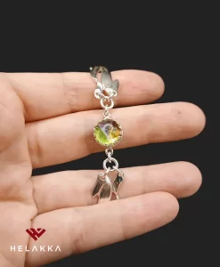 Helakka lusikkarannekoru lasilla vivahde