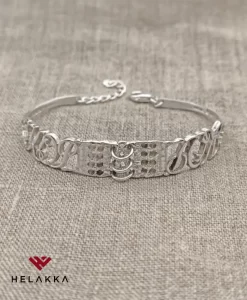 Helakka lusikkarannekoru Tilkku, Pitsi