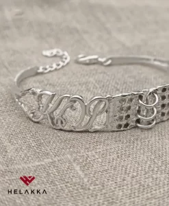 Helakka lusikkarannekoru Tilkku, Pitsi