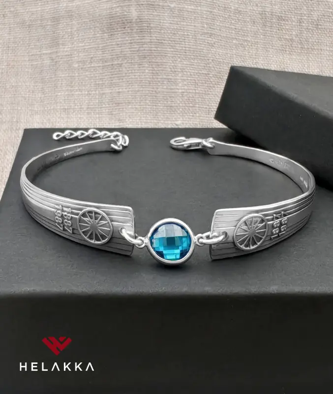 Helakka_lusikkarannekoru Postipankki zirkonia